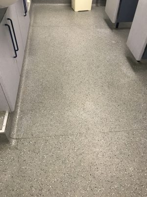 Another photo of a floor before it was cleaned